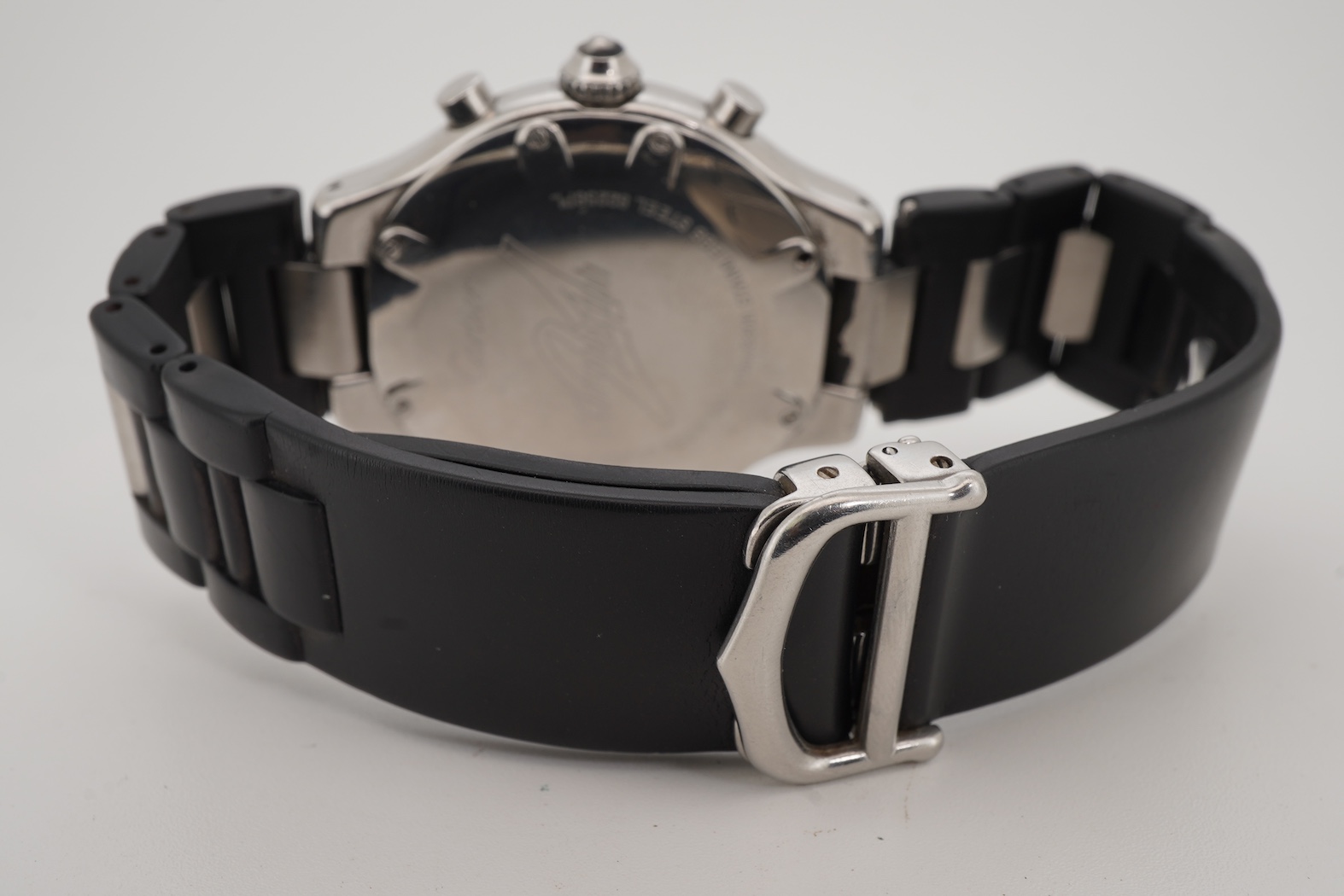 A gentleman's stainless steel Cartier 21 Chronoscaph wrist watch, the black face with three subsidiary dials, date aperture and baton numerals